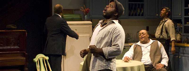 Photo of Alfred H. Wilson, Ronald L. Conner, A.C. Smith, and Brian Weddington in THE PIANO LESSON by Michael Brosilow.