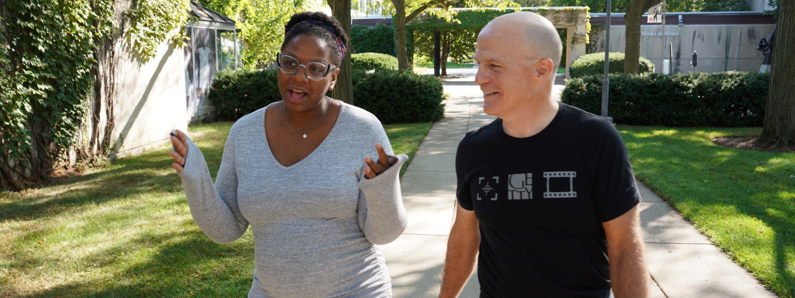 Gabrielle Randle-Bent and Charles Newell walking outside Court Theatre.