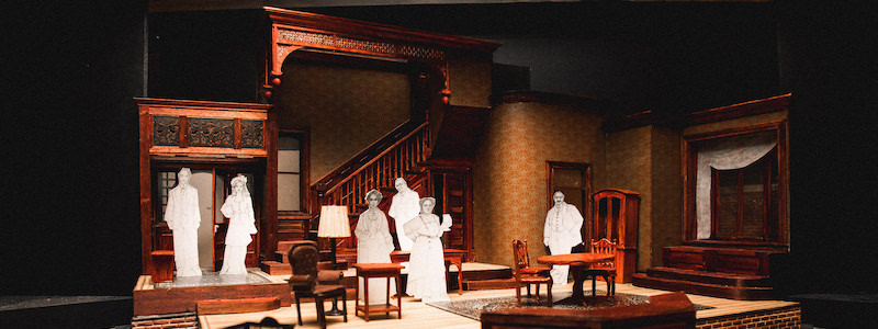 A colorful, small model of a Victorian parlor room