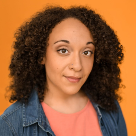 A woman smiling at the camera.